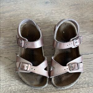 Birkenstock Pink Sandals with Adjustable Straps and Contoured Footbed